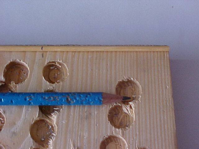 Pencil mark on wooden board